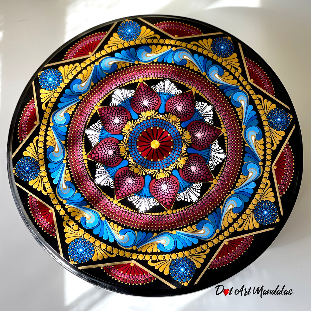 Decorative plate with a colorful mandala design on a white background